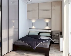 Bedroom with double bed and wardrobe photo