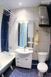 Interior of a combined bathroom with a boiler