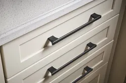 Handles for a light kitchen photo