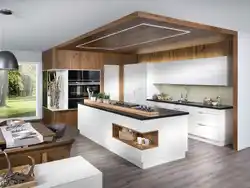 Modern kitchens with an island combined with a living room photo