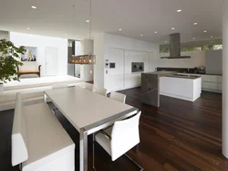 Modern kitchens with an island combined with a living room photo