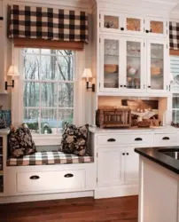 Cabinet By The Window In The Kitchen Photo