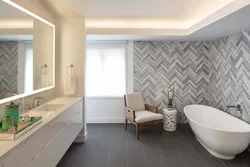 Bathroom design with herringbone tiles