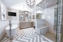 Bathroom design with herringbone tiles