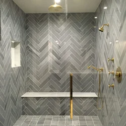 Bathroom design with herringbone tiles