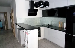 Black kitchens with bar counters photo