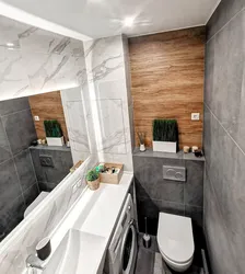 Bathroom design gray porcelain tiles and wood