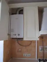 Floor-Standing Boiler And Water Heater In The Kitchen Photo