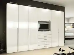 Living room with white wardrobe photo