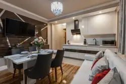 Living room kitchen design with sofa and TV