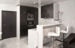 White and black kitchens with bar counters photo