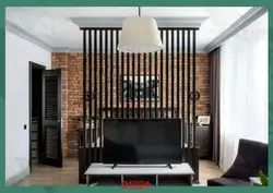 Zoning the living room with slats photo