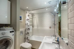 Photo of a bathtub in an apartment with an improved layout