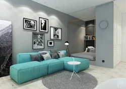 Bedroom with gray sofa photo