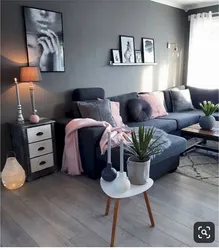 Bedroom with gray sofa photo