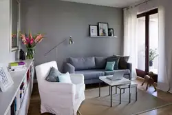 Bedroom with gray sofa photo