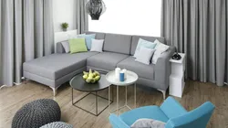 Bedroom with gray sofa photo