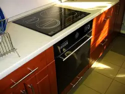 Cooktop and cabinet photo in the kitchen