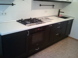 Cooktop and cabinet photo in the kitchen