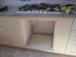 Cooktop And Cabinet Photo In The Kitchen