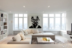 Living room with a large window in a modern style photo