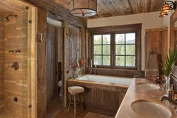 Bath floor in a wooden house photo