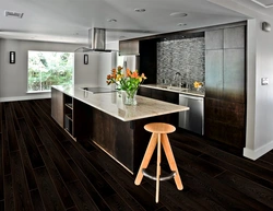 Gray kitchen interior with brown floor