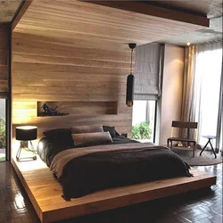 Деревянные брусья в интерьере спальни