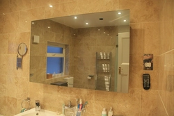 How to hang a mirror in the bathroom photo