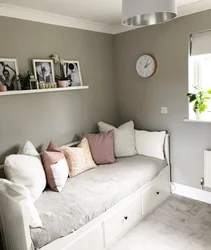 Photo Of The Interior Of A Small Bedroom With A Sofa