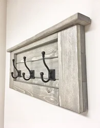 Photo Of Wall-Mounted Wooden Clothes Hangers In The Hallway