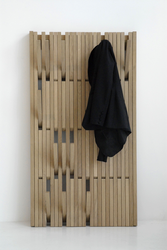 Photo Of Wall-Mounted Wooden Clothes Hangers In The Hallway