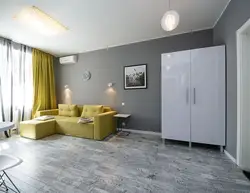 Дизайн гостиной с серым ламинатом