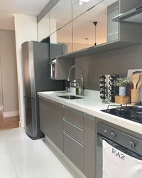 Gray refrigerator in the kitchen interior