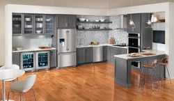 Gray refrigerator in the kitchen interior