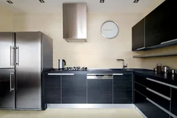 Gray refrigerator in the kitchen interior