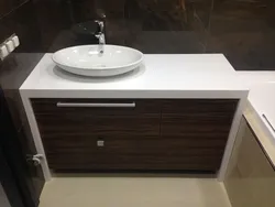 Bathroom cabinet with countertop photo