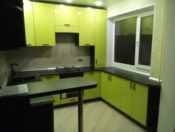 Photo Of Black And Light Green Kitchen