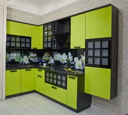 Photo of black and light green kitchen