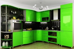Photo of black and light green kitchen