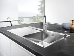 Photo of stainless steel kitchen sink
