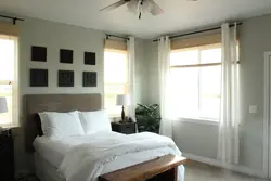 Дызайн спальні з кутнім акном