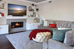 Bedroom design with sofa and fireplace