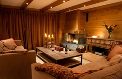 Bedroom design with sofa and fireplace
