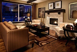 Bedroom design with sofa and fireplace