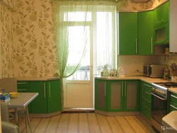 Kitchen with green wallpaper design photo
