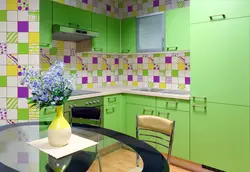 Kitchen with green wallpaper design photo