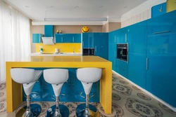 Blue kitchen with yellow photo