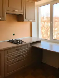 Kitchen with low window sill photo