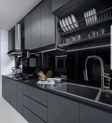 Dark kitchen with black countertop photo